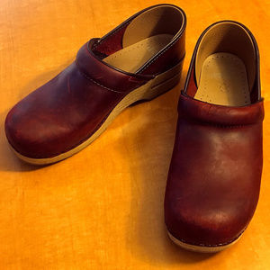 Dansko oiled red clogs